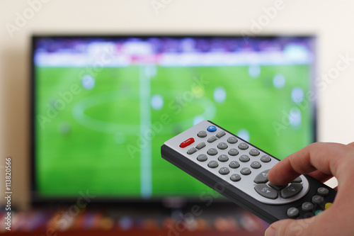 Bilde på lerret Televesion remote control in the hand, zapping