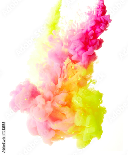 Abstract splash of yellow and pink paint isolated on white background