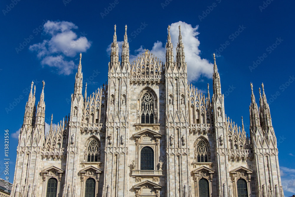 The Milan marble cathedral under blue sky