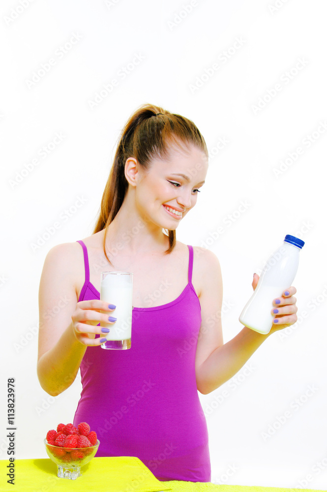 beautiful young girl drinking yogurt , milk and fruit beautiful young girl drinking yogurt , milk and fruit