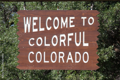 Wooden sign, Welcome to Colorful Colorado