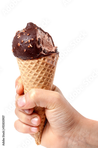 child' hand holding bitten off ice cream isolated on white