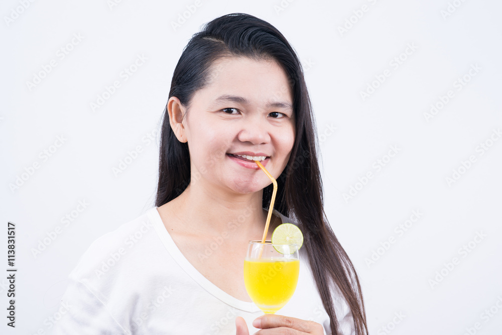Woman drinking lemonad. Healthy food . Skin care and beauty. On Woman drinking lemonad. Healthy food . Skin care and beauty. On