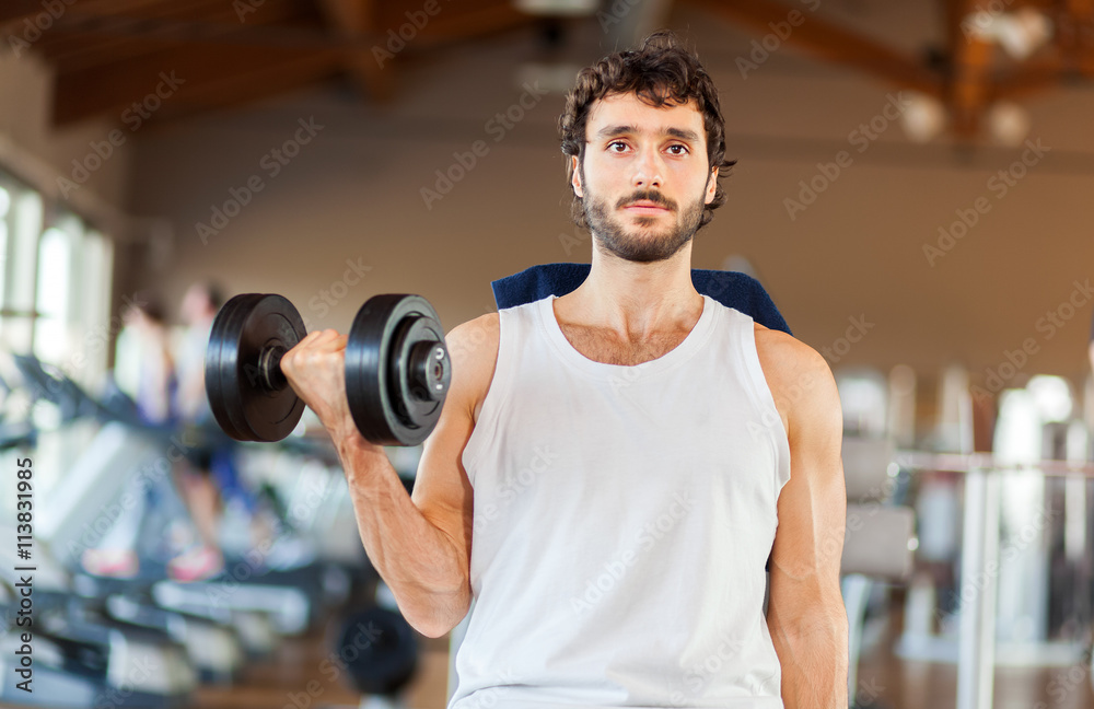 Man working out in a gym Man working out in a gym