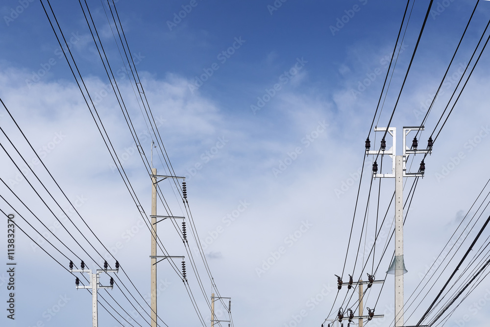 The electricity pole belong the street with the blue sky.The different type of electricity pole with the sky.The concrete electricity post belong the street with the blue sky. The electricity pole belong the street with the blue sky.The different type of electricity pole with the sky.The concrete electricity post belong the street with the blue sky.
