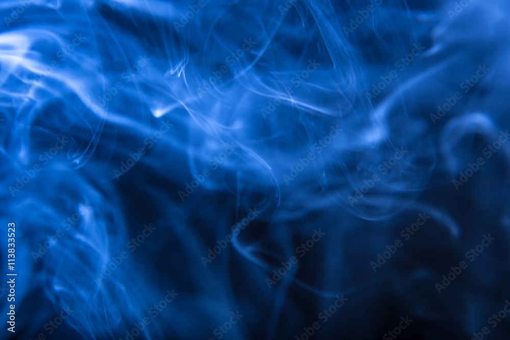 Abstract colorful smoke on the black background