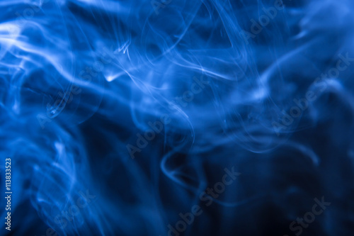 Abstract colorful smoke on the black background
