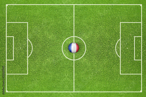 Ball with flag of France on the field