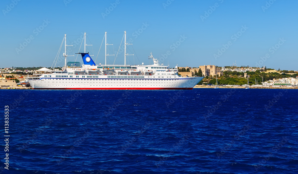 cruise ship in the port of Rhodes, Greece sunny day view from the sea