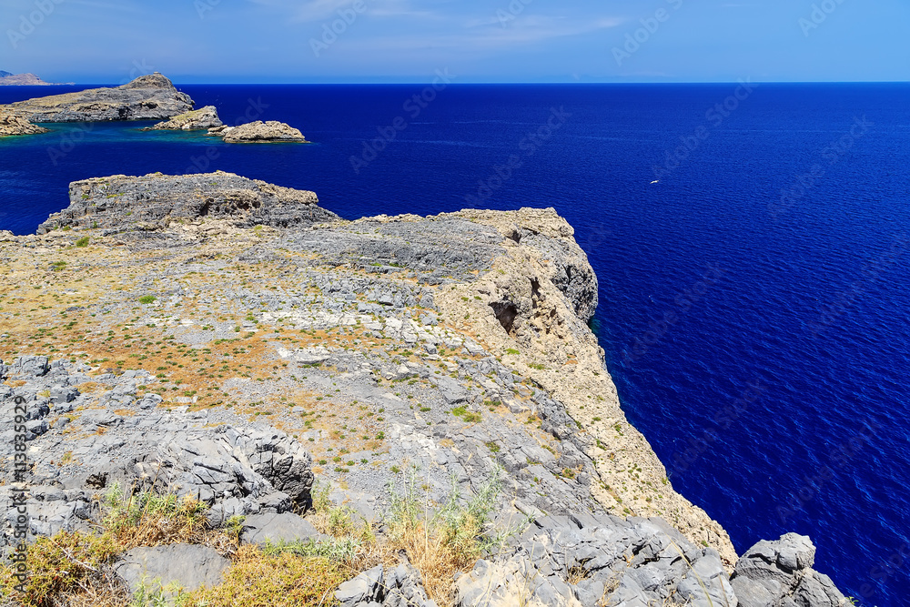 top view from the cliffs on the open sea and islands in volcanic rock,