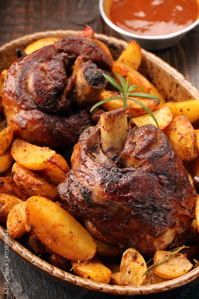 Grilled barbecue meat with baked potato and dip Grilled barbecue meat with baked potato and dip