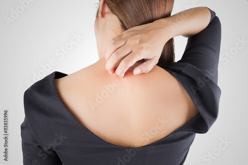 Wallpaper Mural woman scratching her itchy back with allergy rash Torontodigital.ca