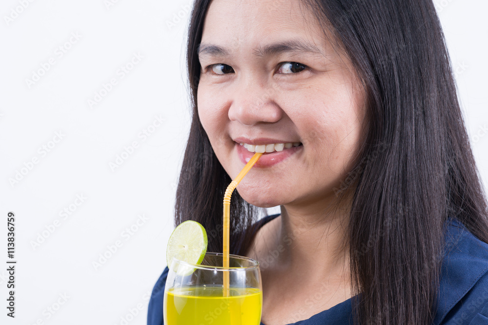 Woman drinking lemonad. Healthy food . Skin care and beauty. On Woman drinking lemonad. Healthy food . Skin care and beauty. On
