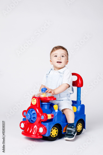baby boy with a toy truck