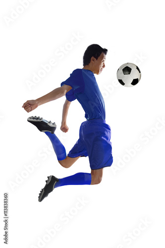 Soccer player receives a ball with his chest