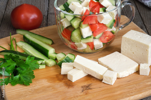 Billede på lærred Salad with vegetables and cheese, ingredients