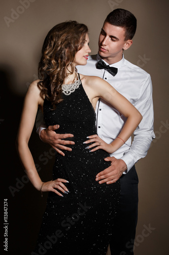 Fashion man and woman gorgeous couple loving , vogue style isolated