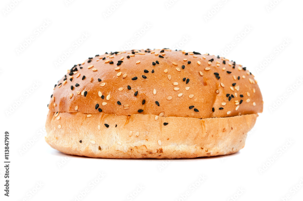 Burger bun with sesame seeds on white background Burger bun with sesame seeds on white background