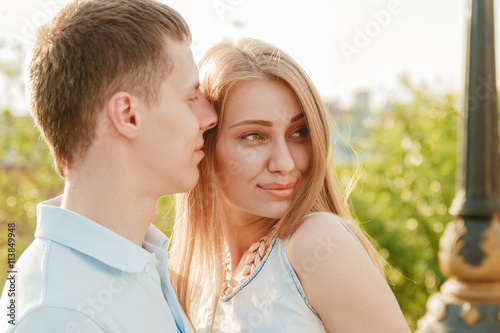 Portrait of Happy Couple Hugging Laughing © MaximBeykov