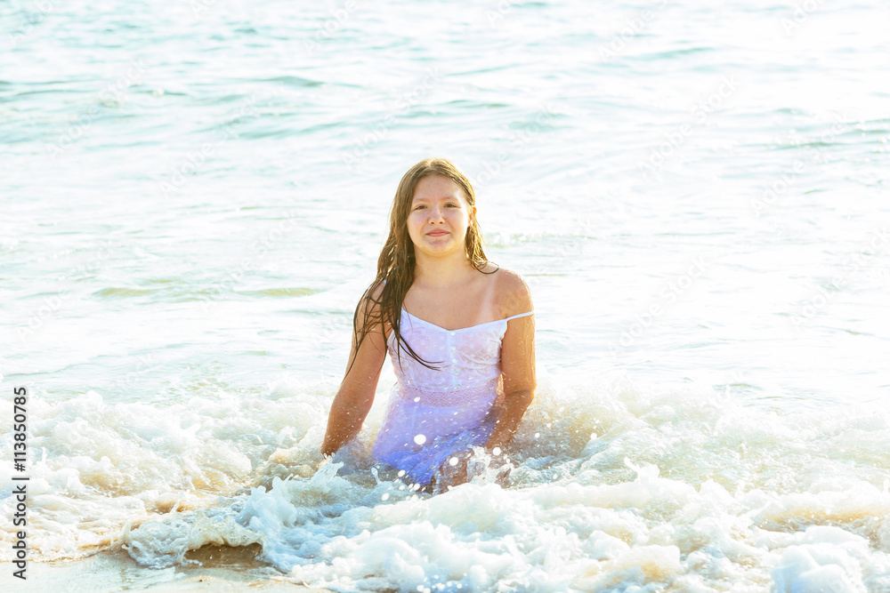 Happy little girl swimming in water Happy little girl swimming in water