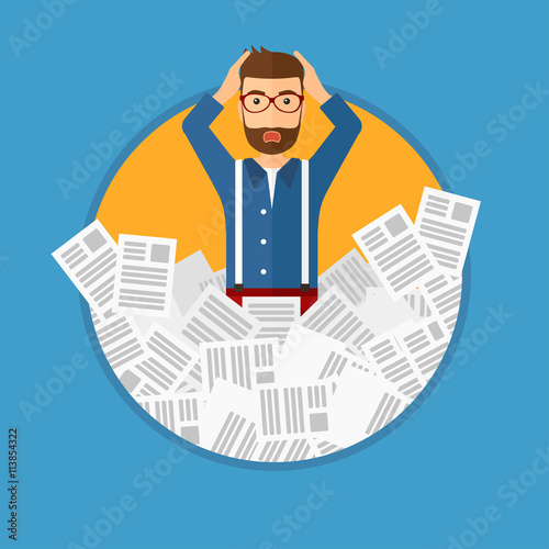 Stressed businessman having lots of work to do.