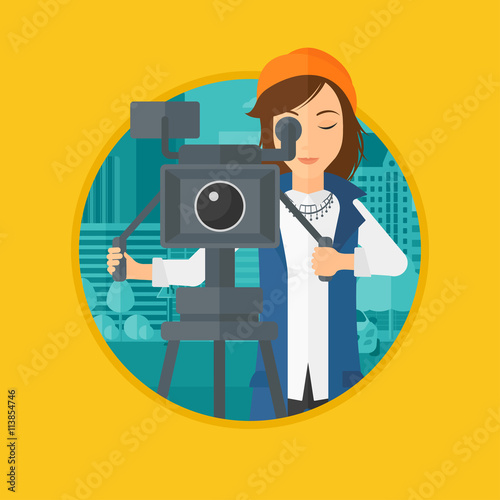 Camerawoman with movie camera on tripod.