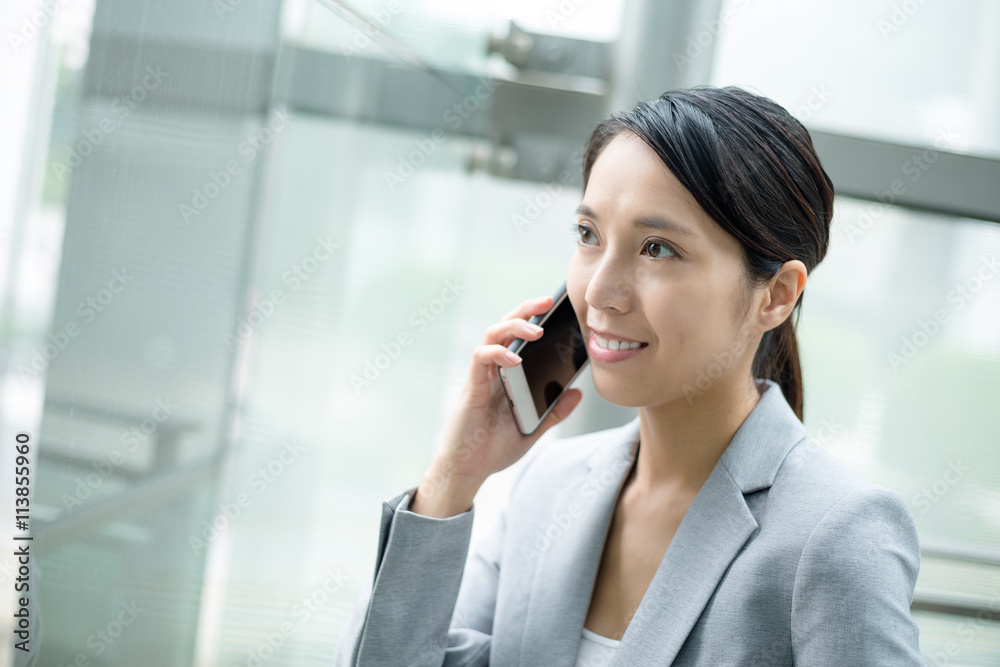 Business woman talk to cellphone Business woman talk to cellphone
