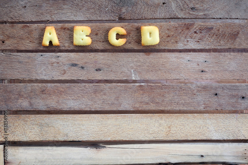 abc biscuit on wooden panel