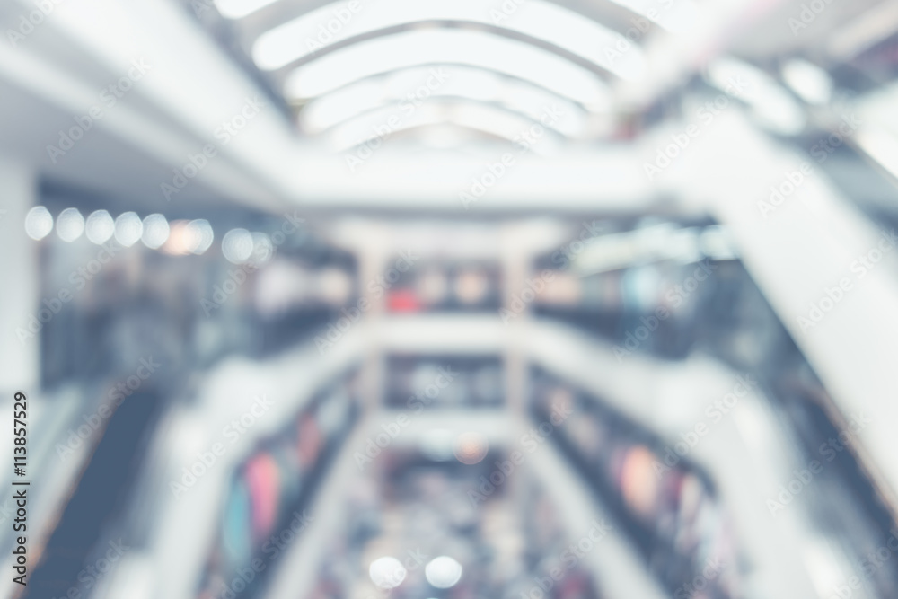 Blurred background, people shopping at department store with bok