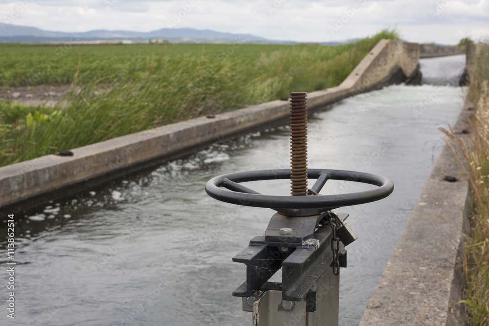 Fototapeta premium Floodgate area at huge irrigation canal, Extremadura, Spain