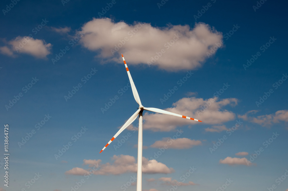 Windmill, blue sky and clouds