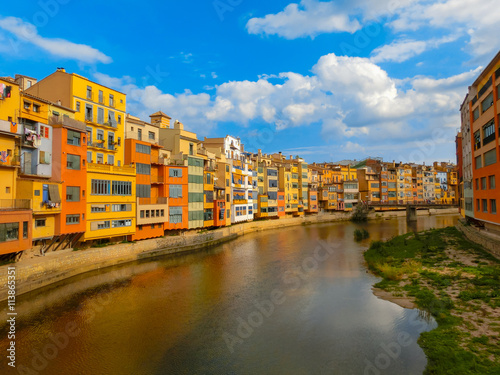 Colorful yellow and orange houses in Girona, Catalonia, Spain. © Solarisys