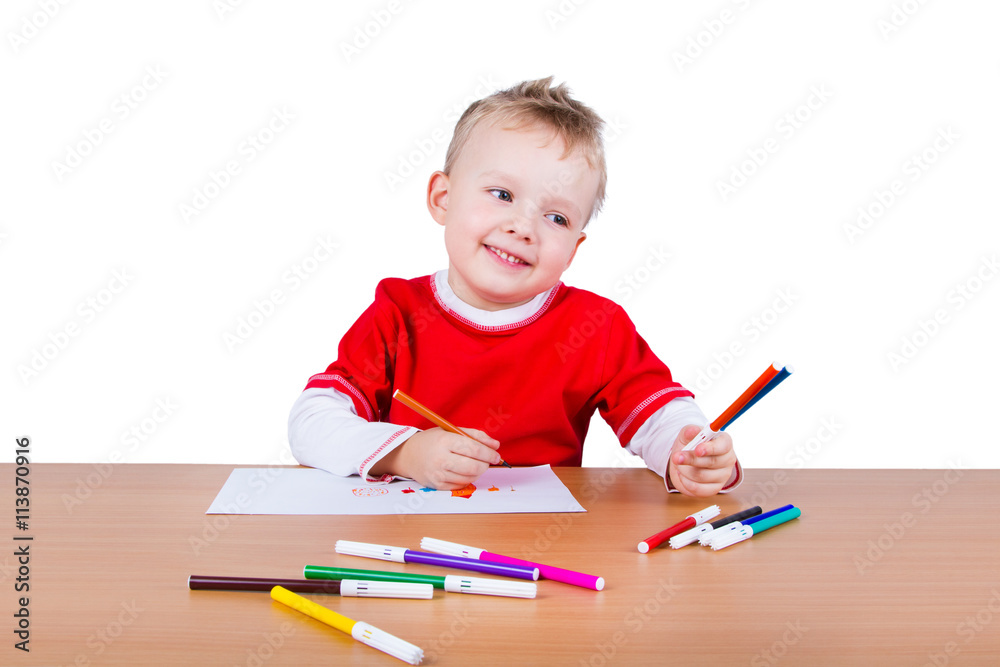 Small boy draws Small boy draws