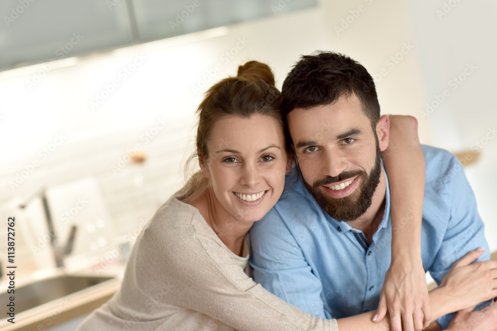 Cheerful hipster couple embracing each other Cheerful hipster couple embracing each other