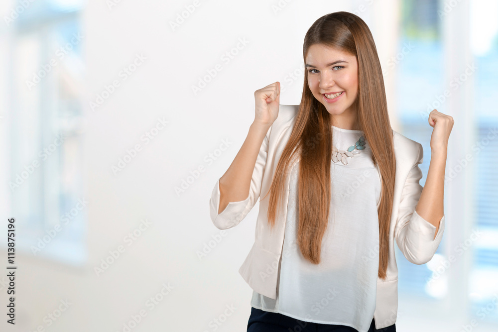 Young happy businesswoman with arms up Young happy businesswoman with arms up