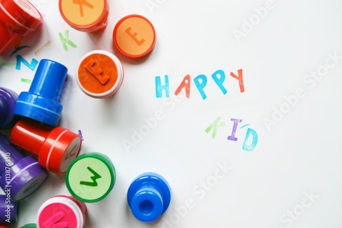 Favourite coloured alphabet stamps for children on a white background