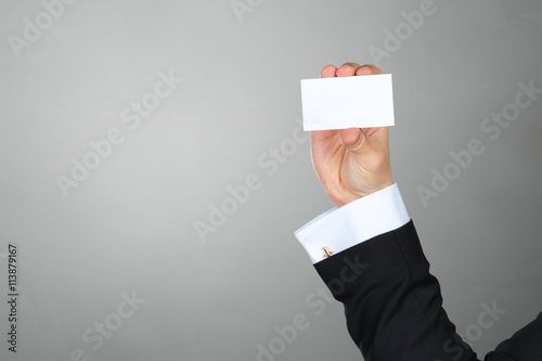 Businessman showing his business card