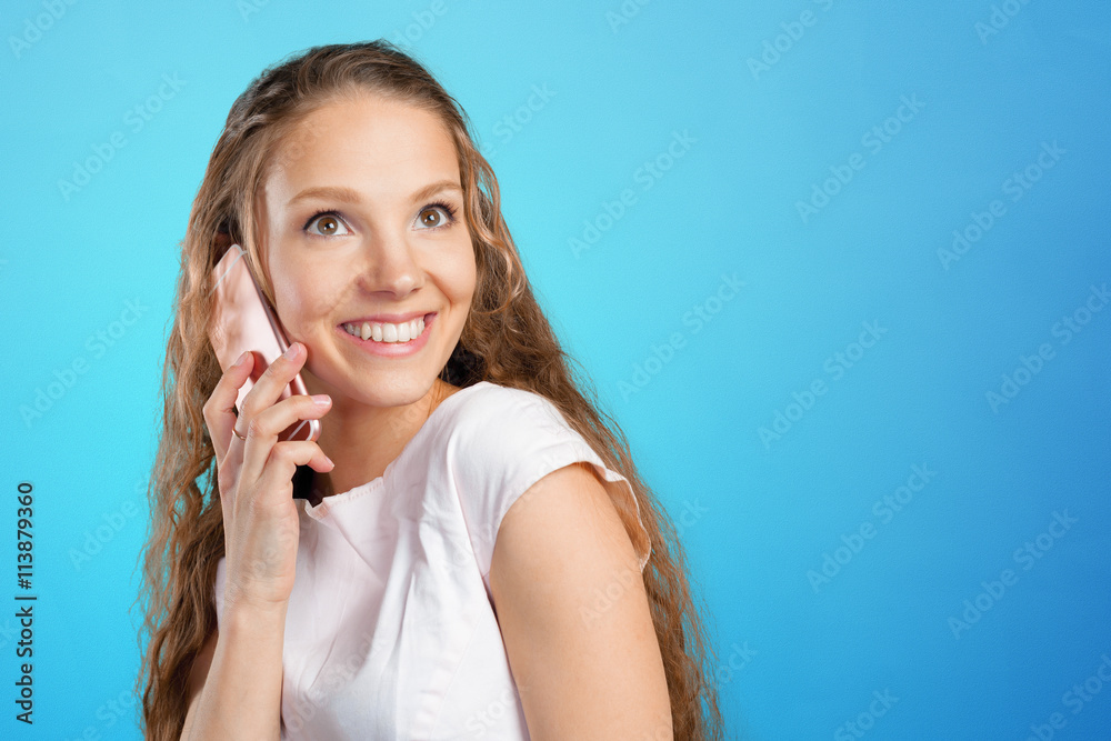 Fototapeta premium Young Woman Using a Cell Phone