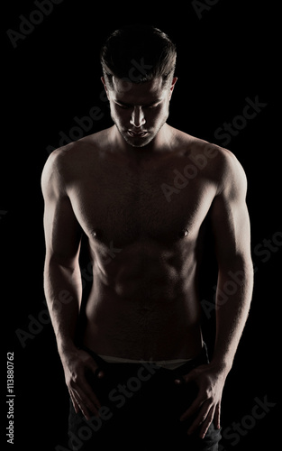 attractive fitness man, trained male body, lifestyle portrait, c © podushko