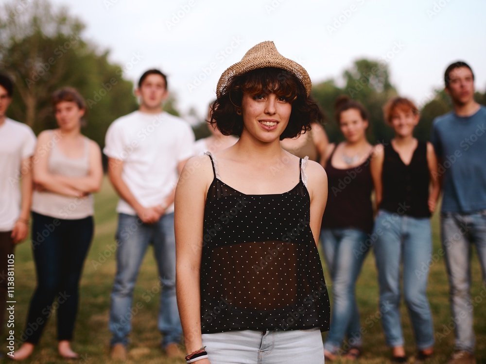 Obraz premium large group of friends together in a park having fun, back to school