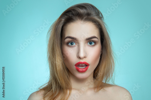 girl with red lips surprised