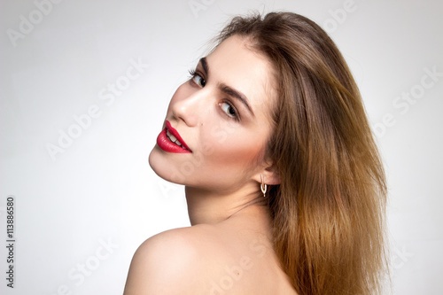 Girl with red lips looking at the camera