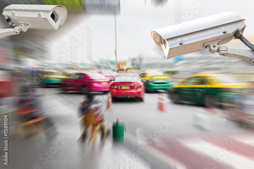 CCTV or surveillance camera recording of traffic in the parking lot for taxis carry passengers inside the departure hall of the airport.