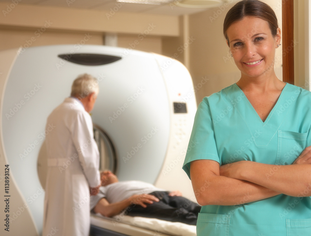 Happy young female doctor with man patient in background undergo Happy young female doctor with man patient in background undergo