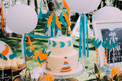 
Design kids birthday parties, family celebrations, children's birthday party in boho style with the dream catchers, sweets and lemonade