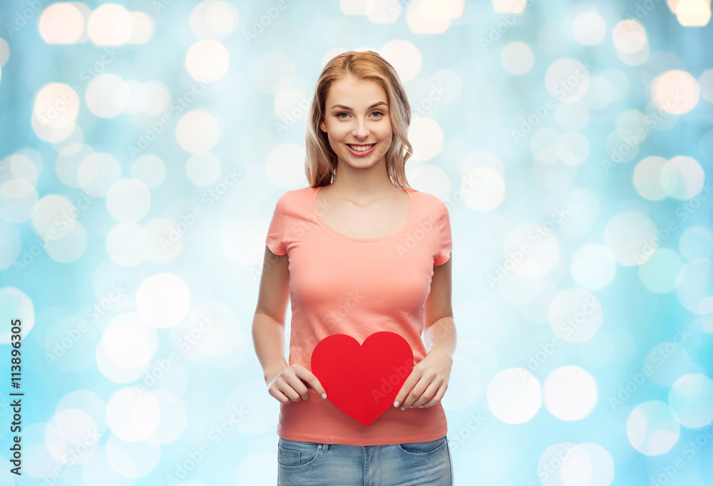 happy woman or teen girl with red heart shape happy woman or teen girl with red heart shape