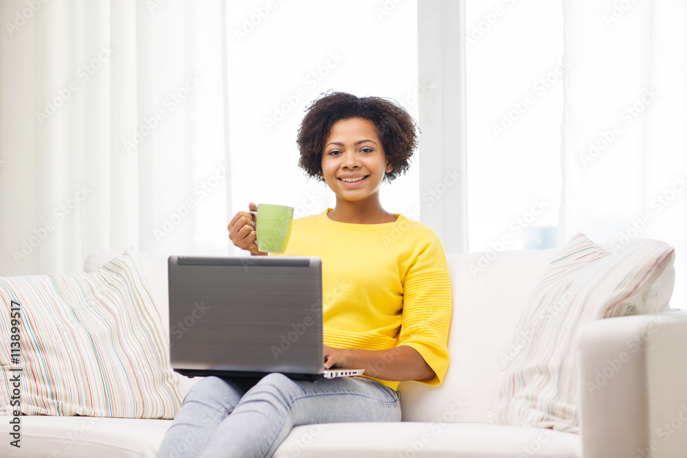 happy african american woman with laptop at home happy african american woman with laptop at home