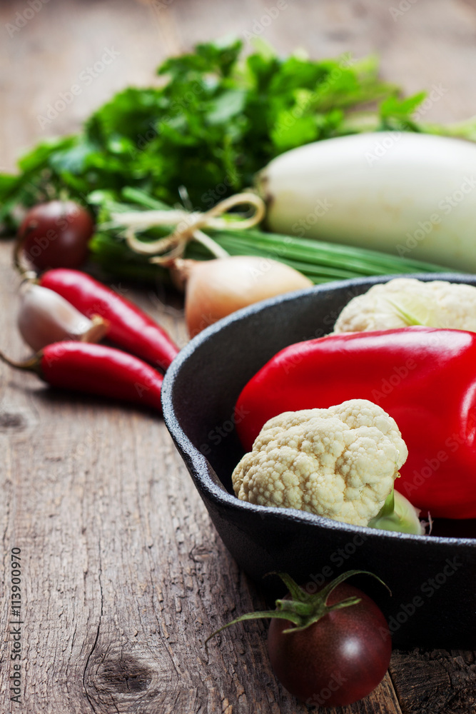 pan and fresh vegetables pan and fresh vegetables
