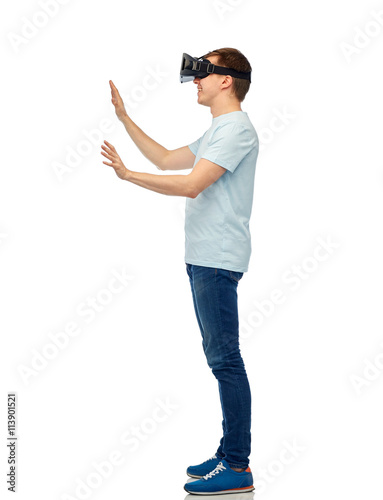happy man in virtual reality headset or 3d glasses