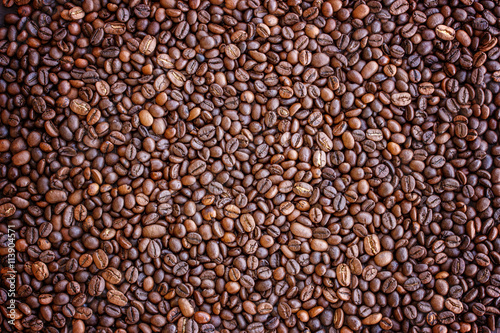 Coffee beans brown background